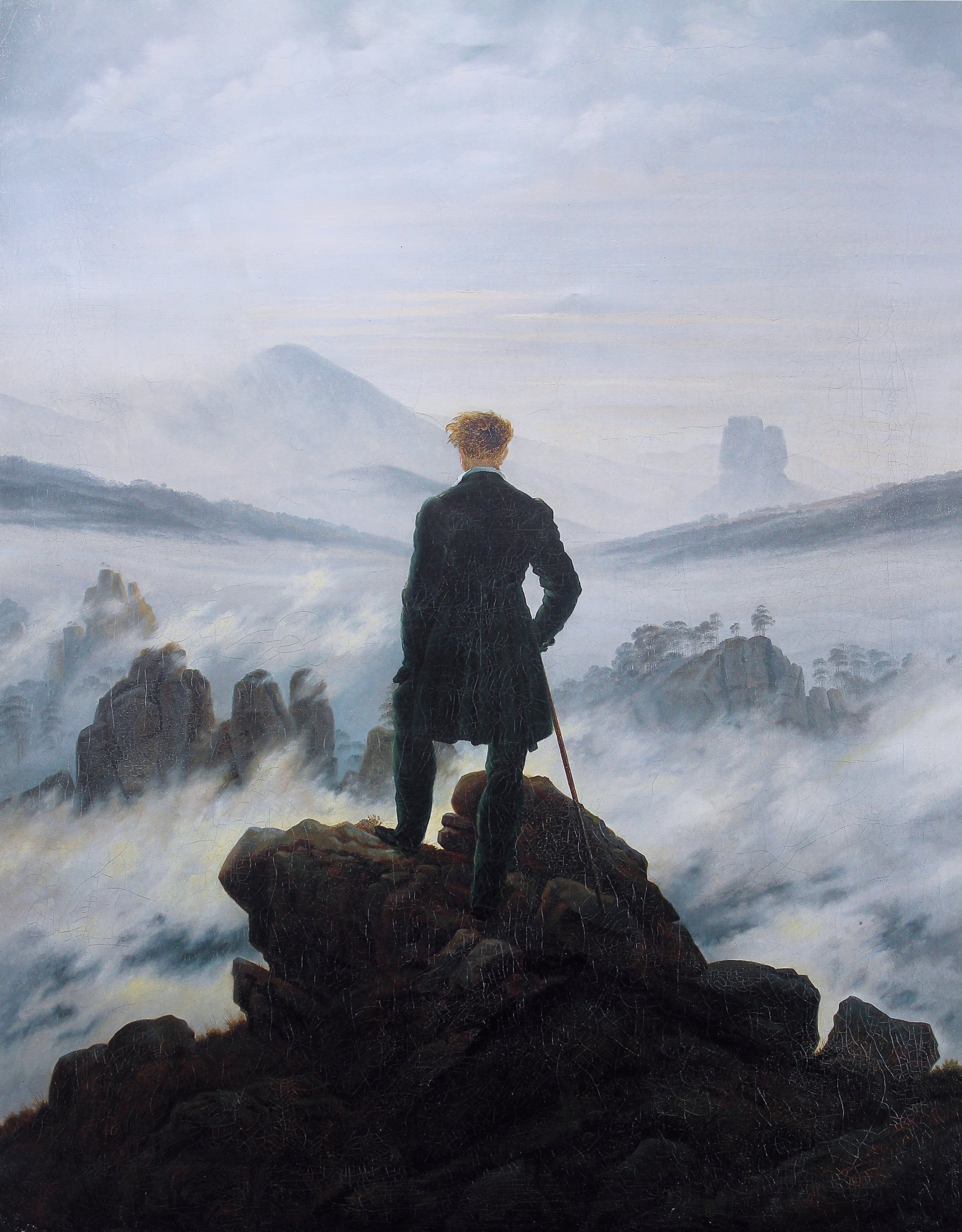 Caspar David Friedrich — Wanderer above the Sea of Fog (1818). A solitary figure stands on a rocky peak, back to the viewer, gazing out over a sea of clouds and distant mountains.